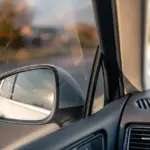 como regular o retrovisor do carro