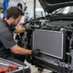 mecânico instalando radiador no carro durante manutenção em oficina